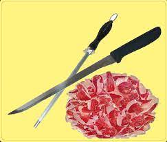 Cuchillo jamonero y plato de jamon